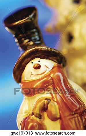 Low angle view of a snowman figurine View Large Photo Image Stock Image - Low angle view of a snowman figurine. Fotosearch