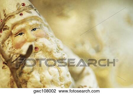 Close-up of a Santa Claus figurine View Large Photo Image Stock Image - Close-up of a Santa Claus figurine. Fotosearch
