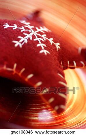 Close-up of a star shaped cushion View Large Photo Image Stock Photograph - Close-up of a star shaped cushion. Fotosearch