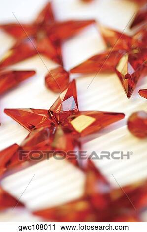 Close-up of star shaped Christmas ornaments View Large Photo Image Stock Image - Close-up of star shaped Christmas ornaments. Fotosearch