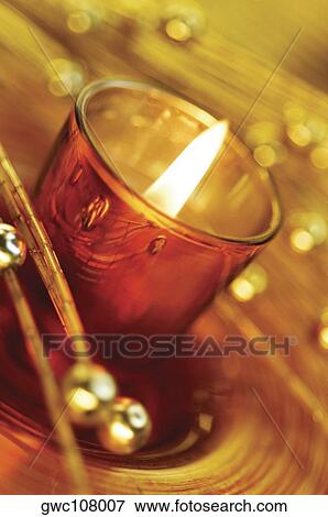 High angle view of a candle in a glass View Large Photo Image Stock Photo - High angle view of a candle in a glass. Fotosearch