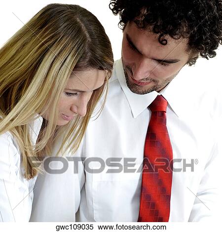 Close-up of a businessman and a businesswoman View Large Photo Image Stock Photography - Close-up of a businessman and a businesswoman. Fotosearch