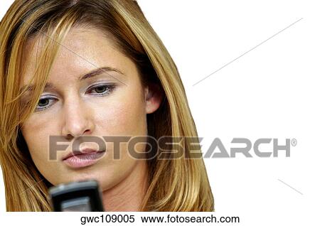 Close-up of a businesswoman using a mobile phone View Large Photo Image Stock Photography - Close-up of a businesswoman using a mobile phone. Fotosearch