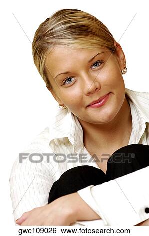 Portrait of a businesswoman hugging her knees View Large Photo Image Stock Photograph - Portrait of a businesswoman hugging her knees. Fotosearch