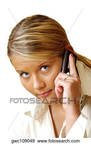 Portrait of a businesswoman talking on a mobile phone View Large Photo Image Stock Photo - Portrait of a businesswoman talking on a mobile phone. Fotosearch
