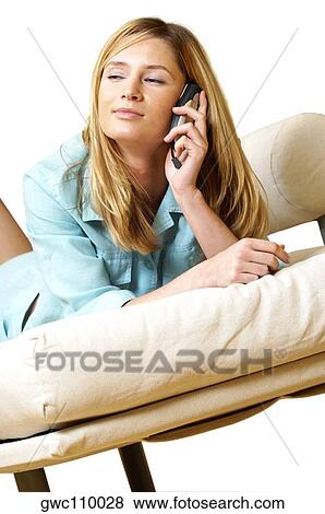 Businesswoman talking on a mobile phone View Large Photo Image Stock Photo - Businesswoman talking on a mobile phone. Fotosearch