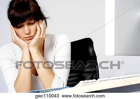 Close-up of a businesswoman looking depressed View Large Photo Image Stock Image - Close-up of a businesswoman looking depressed. Fotosearch