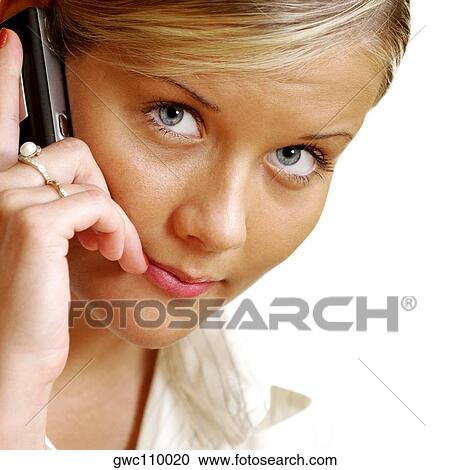 Portrait of a businesswoman talking on a mobile phone View Large Photo Image Stock Image - Portrait of a businesswoman talking on a mobile phone. Fotosearch