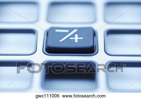 Stock Photography - Close-up of a button on a calculator. Fotosearch