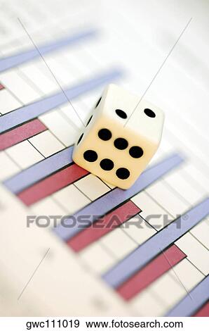 Close-up of a dice on a bargraph View Large Photo Image Stock Photo - Close-up of a dice on a bargraph. Fotosearch