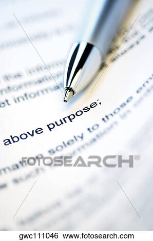Stock Photograph - Close-up of a pen on a document. Fotosearch