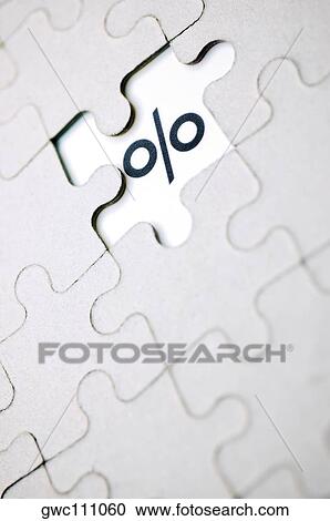Close-up of a percentage sign and a jigsaw puzzle View Large Photo Image Stock Image - Close-up of a percentage sign and a jigsaw puzzle. Fotosearch