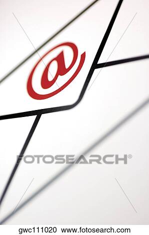 Close-up of an 'at' symbol on an envelope View Large Photo Image Stock Image - Close-up of an 'at' symbol on an envelope. Fotosearch