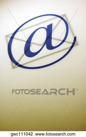 Close-up of an 'at' symbol on an envelope View Large Photo Image Stock Image - Close-up of an 'at' symbol on an envelope. Fotosearch