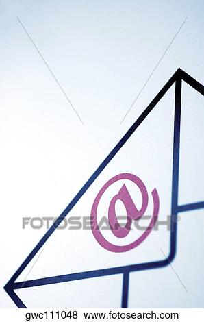 Close-up of an 'at' symbol on an envelope View Large Photo Image Stock Photo - Close-up of an 'at' symbol on an envelope. Fotosearch