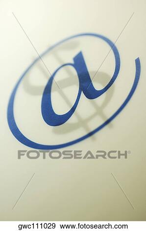 Close-up of an 'at' symbol over a dollar sign View Large Photo Image Stock Photo - Close-up of an 'at' symbol over a dollar sign. Fotosearch