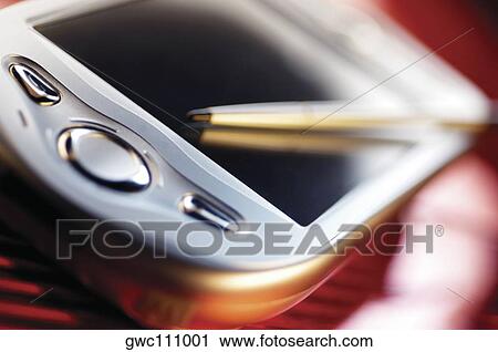Stock Image - Close-up of buttons of a personal data assistant. Fotosearch