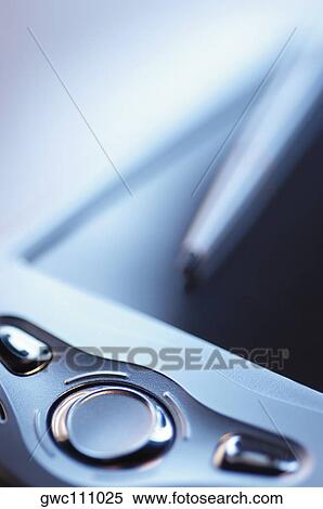 Stock Photography - Close-up of buttons of a personal data assistant. Fotosearch