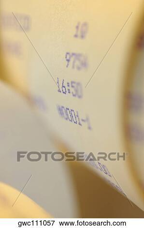 Close-up of numbers on a scroll receipt View Large Photo Image Stock Photo - Close-up of numbers on a scroll receipt. Fotosearch