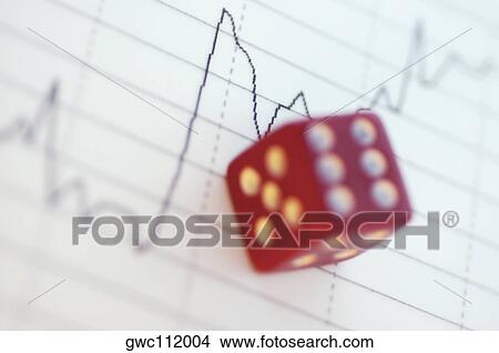 Close-up of a dice over a line graph View Large Photo Image Picture - Close-up of a dice over a line graph. Fotosearch