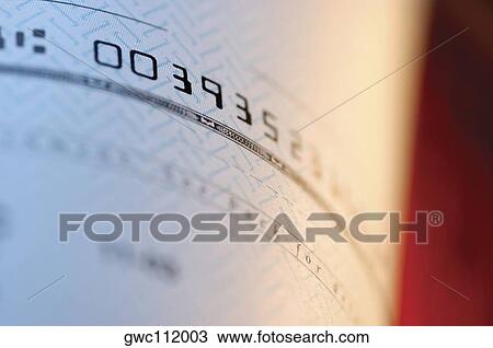 Close-up of a number on a check View Large Photo Image Stock Image - Close-up of a number on a check. Fotosearch