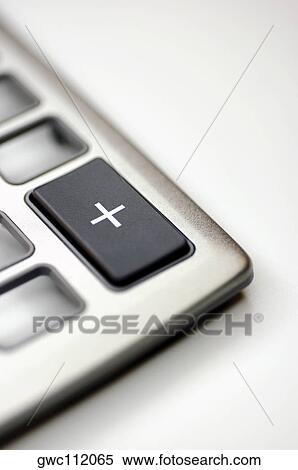 Close-up of an addition button on a calculator View Large Photo Image Stock Photography - Close-up of an addition button on a calculator. Fotosearch