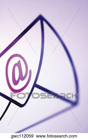 Close-up of an 'at' symbol on an envelope View Large Photo Image Stock Photo - Close-up of an 'at' symbol on an envelope. Fotosearch