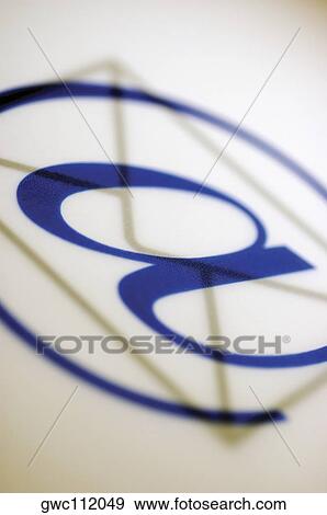 Close-up of an 'at' symbol over an envelope View Large Photo Image Stock Photo - Close-up of an 'at' symbol over an envelope. Fotosearch