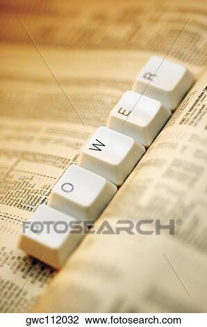 Close-up of computer keys on a newspaper View Large Photo Image Stock Image - Close-up of computer keys on a newspaper. Fotosearch