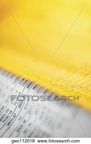 Close-up of financial figures on a newspaper View Large Photo Image Stock Photo - Close-up of financial figures on a newspaper. Fotosearch