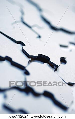 Picture - Close-up of jigsaw pieces. Fotosearch