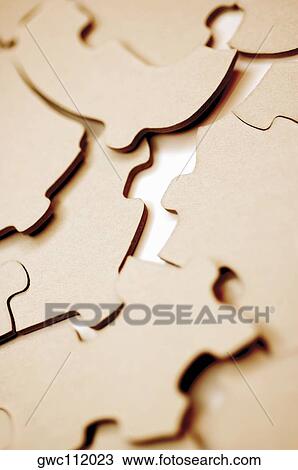 Close-up of jigsaw pieces View Large Photo Image Stock Image - Close-up of jigsaw pieces. Fotosearch