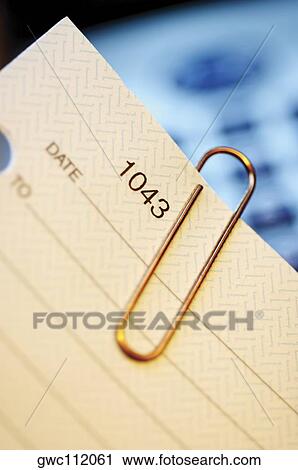 Paper clip on a check View Large Photo Image Stock Image - Paper clip on a check. Fotosearch