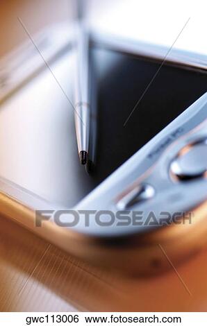 Close-up of a digitized pen on a personal data assistant View Large Photo Image Stock Photograph - Close-up of a digitized pen on a personal data assistant. Fotosearch