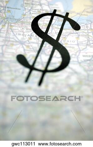 Close-up of a dollar sign on a globe View Large Photo Image Stock Image - Close-up of a dollar sign on a globe. Fotosearch