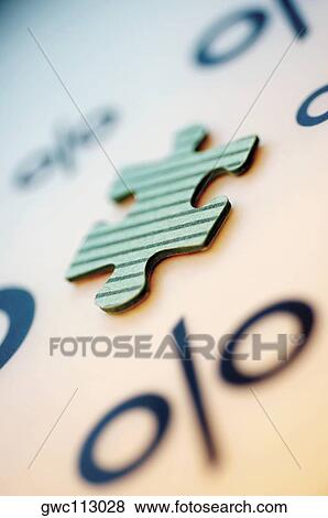 Close-up of a jigsaw piece and a percentage sign View Large Photo Image Stock Photo - Close-up of a jigsaw piece and a percentage sign. Fotosearch