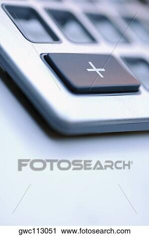 Close-up of an addition button on a calculator View Large Photo Image Stock Image - Close-up of an addition button on a calculator. Fotosearch