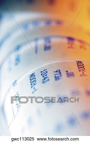 Close-up of numbers on a scroll receipt View Large Photo Image Stock Photography - Close-up of numbers on a scroll receipt. Fotosearch