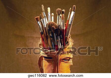 Close-up of paintbrushes in a holder View Large Photo Image Stock Image - Close-up of paintbrushes in a holder. Fotosearch