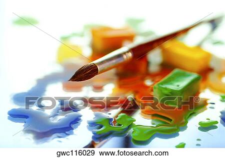 Close-up of watercolor paint cubes and a paintbrush View Large Photo Image Stock Photo - Close-up of watercolor paint cubes and a paintbrush. Fotosearch