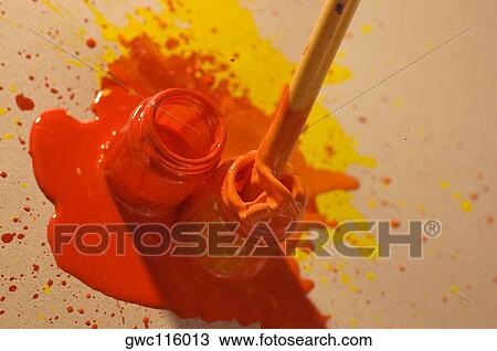 High angle view of a paintbrush dipped into a bottle of paint View Large Photo Image Stock Image - High angle view of a paintbrush dipped into a bottle of paint. Fotosearch