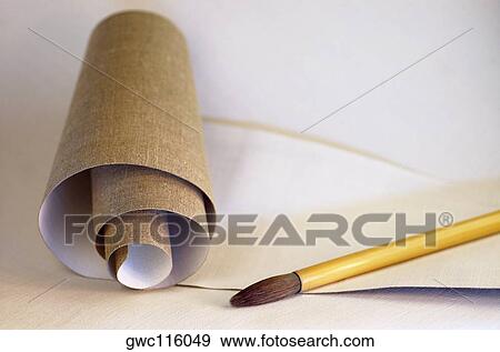 High angle view of a roll of canvas and a paintbrush View Large Photo Image Stock Photo - High angle view of a roll of canvas and a paintbrush. Fotosearch