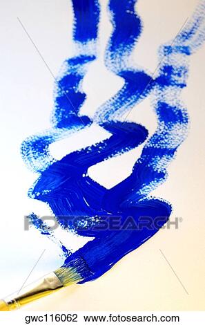 High angle view of blue paint and a paintbrush View Large Photo Image Stock Image - High angle view of blue paint and a paintbrush. Fotosearch