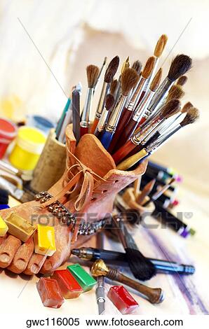 High angle view of paintbrushes in a holder View Large Photo Image Stock Photography - High angle view of paintbrushes in a holder. Fotosearch