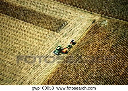 Aerial view of combine harvesting corn, Clinton county, OH View Large Photo Image Stock Image - Aerial view of combine harvesting corn, Clinton county, OH. Fotosearch