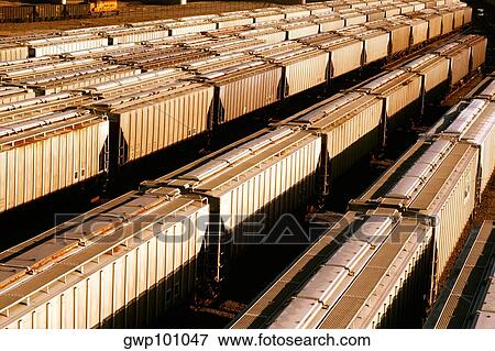 Freight cars waiting on tracks in Baltimore, MD View Large Photo Image Stock Photo - Freight cars waiting on tracks in Baltimore, MD. Fotosearch