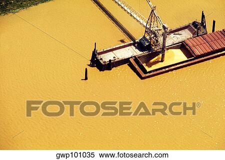 Loading grain in Mississippi River, shot from above. View Large Photo Image Stock Photography - Loading grain in Mississippi River, shot from above.. Fotosearch