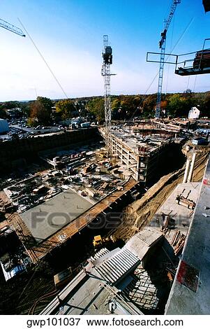 Pouring cement on construction site for new office building in Bethesda, Maryland View Large Photo Image Stock Photo - Pouring cement on construction site for new office building in Bethesda, Maryland. Fotosearch
