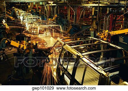 Robots weld van bodies at General Motors plant in Baltimore, MD View Large Photo Image Stock Photo - Robots weld van bodies at General Motors plant in Baltimore, MD. Fotosearch