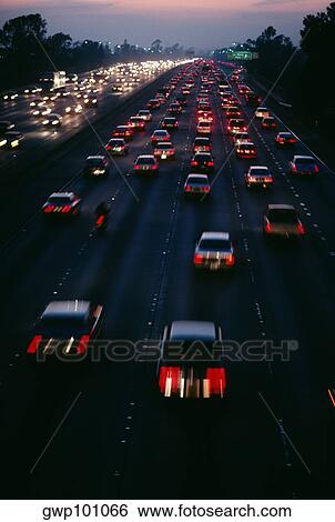 Traffic on Santa Monica freeway at sunset, Los Angeles, CA View Large Photo Image Stock Photograph - Traffic on Santa Monica freeway at sunset, Los Angeles, CA. Fotosearch